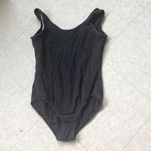 This is a super comfy cloth bodysuit that is black!